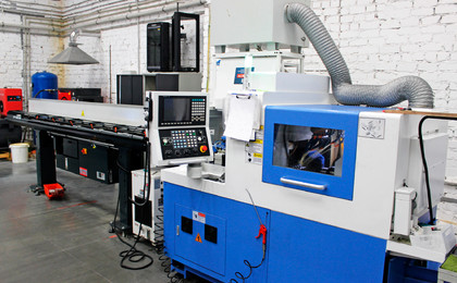 Автоматический токарный станок продольного точения